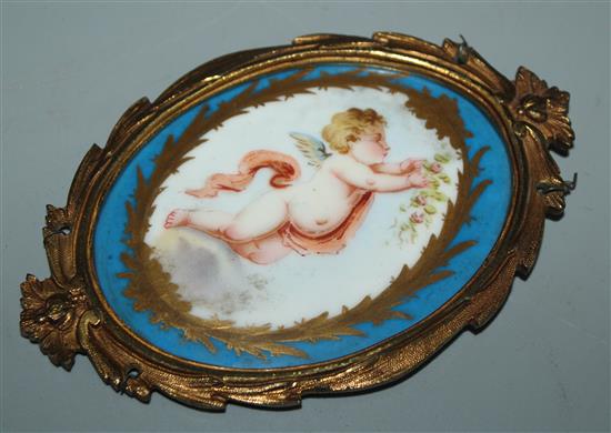 Sevres style porcelain oval plaque in ormolu mount